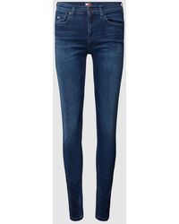 Tommy Hilfiger - Skinny Fit Jeans mit Label-Stitching Modell 'NORA' - Lyst