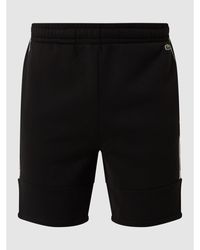 Lacoste Regular Fit Sweatshorts mit Logo-Streifen - Schwarz
