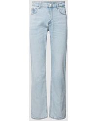 Review - Straight Fit Jeans mit Label-Patch - Lyst