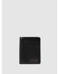 Guess Portemonnaie aus Leder mit Reißverschlussfach - Schwarz