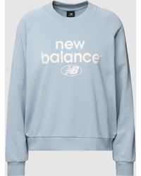 New Balance Sweatshirt Met Labelprint, Model 'essentials Graphic' - Blauw