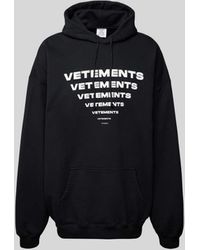 Vetements - Oversized Hoodie mit Label-Print - Lyst