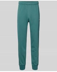 Champion - Sweatpants mit elastischem Bund und Label-Stitching - Lyst