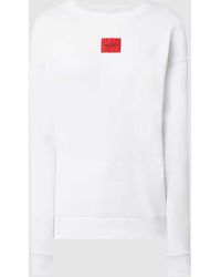 HUGO - Regular-Fit Sweatshirt aus Baumwolle mit rotem Logo-Etikett - Lyst