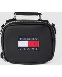 Dames Tassen voor voor Make-uptasjes en beautycases Tommy Hilfiger Denim Microtas Met Labelpatch in het Zwart 