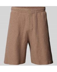 Review - Regular Fit Sweatshorts mit Strukturmuster - Lyst