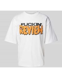 Review - T-Shirt mit Statement- und Label-Print - Lyst
