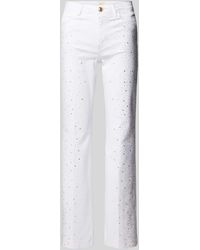 Guess - Flared Jeans mit Ziersteinbesatz Modell '1981' - Lyst