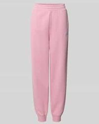 PUMA - Slim Fit Sweatpants Met Labelstitching - Lyst