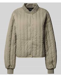 Rains - Steppjacke mit Knopfverschluss Modell 'Banja Liner' - Lyst