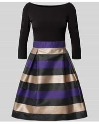 Swing - Knielanges Cocktailkleid mit Effektgarn - Lyst