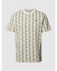 Lacoste - T-Shirt mit grafischem Allover-Muster - Lyst