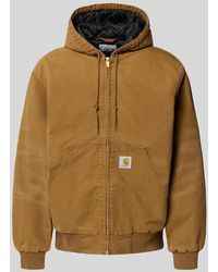 Carhartt - Jacke mit Känguru-Tasche und Label-Detail - Lyst