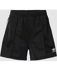 adidas Originals - Shorts mit fixierten Bügelfalten Modell 'FIREBIRD' - Lyst