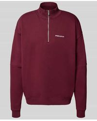 PEGADOR - Oversized Sweatshirt mit Logo-Stitching und Troyer-Kragen - Lyst