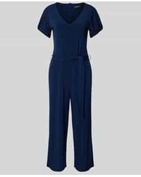 MORE&MORE - Jumpsuit Met V-hals En Strikceintuur - Lyst
