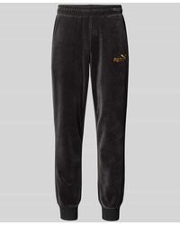 PUMA - Relaxed Fit Sweatpants Mit Label-Stitching Modell 'Velvettrack' - Lyst