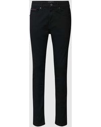Tommy Hilfiger - Slim Fit Jeans im 5-Pocket-Design Modell 'Austin' - Lyst