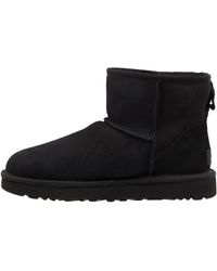 UGG Kouri - Suède Klomplaarzen Met Hak in het Bruin | Lyst NL
