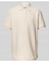 PUMA - Relaxed Fit Poloshirt mit Label-Stitching - Lyst