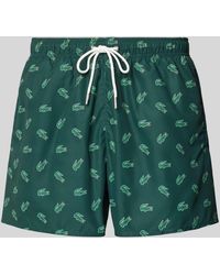 Lacoste - Badehose mit Allover-Logo-Muster - Lyst