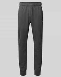 Champion - Sweatpants Met Labeldetail - Lyst