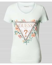 Guess - T-Shirt mit Motiv- und Label-Print Modell 'TRIANGLE FLOWERS' - Lyst