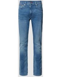 Tommy Hilfiger - Tapered Fit Jeans im 5-Pocket-Design Modell 'HOUSTON' - Lyst