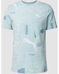 PUMA - T-shirt Met All-over Labelmotief - Lyst