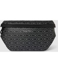 Calvin Klein - Handtasche mit Logo-Muster - Lyst