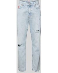 Tommy Hilfiger - Relaxed Tapered Fit Jeans im Destroyed-Look Modell 'ISAAC' - Lyst