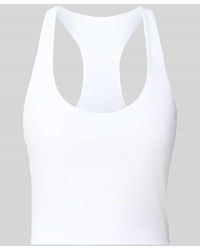 Fabletics - Cropped Top mit integrierten Cups - Lyst