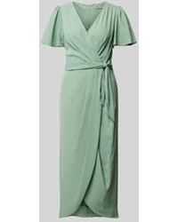 Christian Berg Cocktail - Wikkeljurk Met Strikceintuur - Lyst