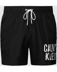 Calvin Klein - PLUS SIZE Badehose mit Label-Print - Lyst