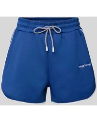 TheJoggConcept - Loose Fit Shorts mit Label-Stitching Modell 'SIMA' - Lyst