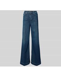 Closed - Flared Fit Jeans mit Logo-Patch - Lyst