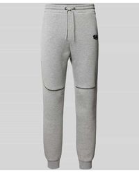 Review - Tapered Fit Sweatpants mit Label-Print - Lyst