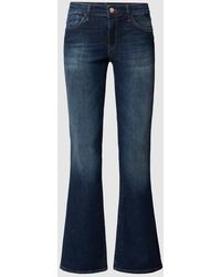Mavi - Slim Fit Bootcut Jeans mit Viskose-Anteil Modell 'Bella' - Lyst