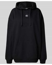 adidas Originals - Relaxed Fit Hoodie mit Label-Stitching und Känguru-Tasche - Lyst