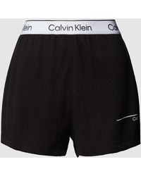 Calvin Klein - Korte Relaxed Fit Pyjamabroek Met Labelprint - Lyst