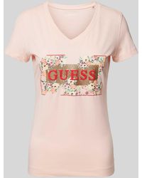 Guess - T-Shirt mit floralem Muster und Label-Print - Lyst