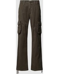 Alpha Industries - Flared Cut Cargohose mit Label-Patch Modell 'JET' - Lyst