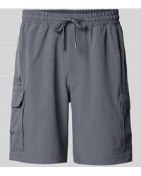 Under Armour - Regular Fit Shorts mit elastischem Bund - Lyst