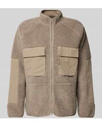 Peak Performance - Jacke Mit Teddyfell Und Aufgesetzten Pattentaschen - Lyst