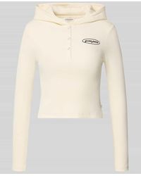 Guess - Slim Fit Longsleeve mit Kapuze und Label-Stitching - Lyst