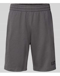 EA7 - Shorts mit Label-Detail - Lyst