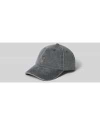 Forét - Base Cap mit floralem Stitching - Lyst