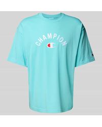 Champion - Relaxed Fit T-Shirt mit Label-Stitching - Lyst