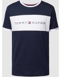 Tommy Hilfiger - Blaues Lounge-T-Shirt mit Rundhalsausschnitt und kontrastierendem Logo-Einsatz auf der Vorderseite - Lyst
