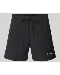 Champion - Regular Fit Badehose mit Label-Stitching - Lyst